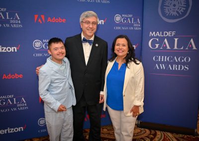 Nancy Andrade and her son with MALDEF President and General Counsel Thomas A. Saenz.